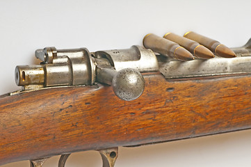 Image showing carbine with ammunition