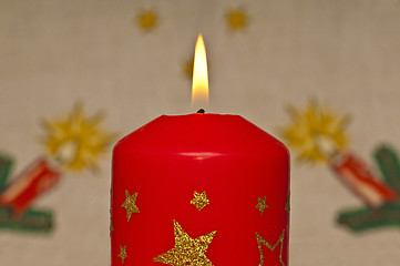 Image showing  candlelight with Christmas background