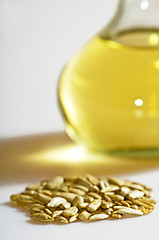 Image showing sunflower oil and sunflower seeds