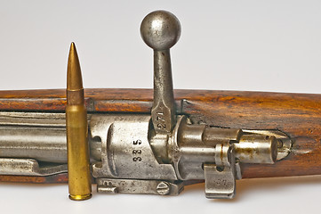 Image showing carbine with ammunition