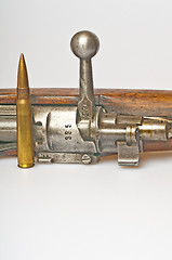 Image showing carbine with ammunition