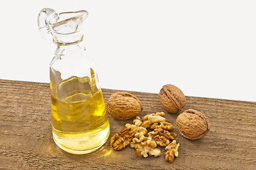Image showing walnut oil with walnuts