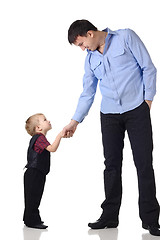 Image showing Handshake of a man and boy