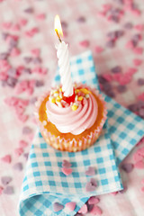 Image showing Pink muffin with candle