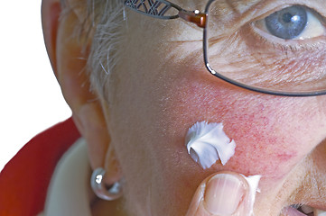 Image showing pensioner with ointment