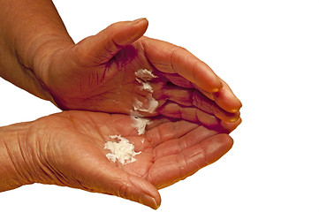 Image showing hands with creme