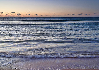 Image showing peaceful beach sunrise