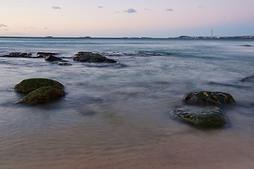 Image showing peaceful beach sunrise