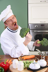 Image showing Funny young Chef with broccoli