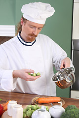 Image showing Young Chef with Brussels sprouts