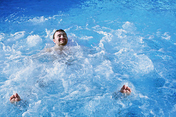 Image showing bathing in jacuzzi of spa center