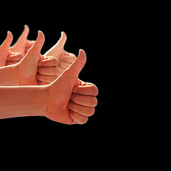 Image showing thumbs up on a black background