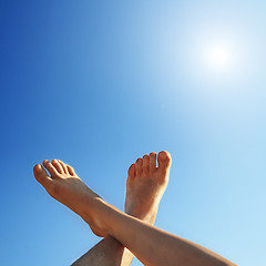 Image showing feet and sun