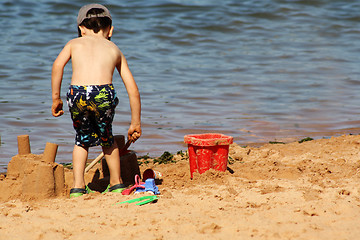 Image showing Child playing on beach