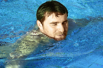 Image showing young man in water