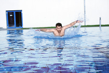 Image showing dynamic swimmer in pool