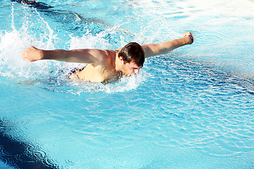 Image showing man swimming butterfly