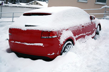 Image showing red car covered 