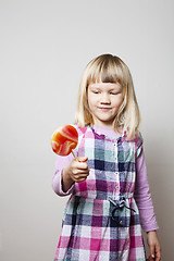 Image showing Little girl with lollipop