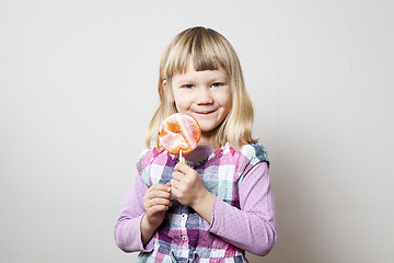 Image showing Little girl with lollipop