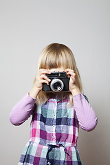 Image showing Little girl with camera