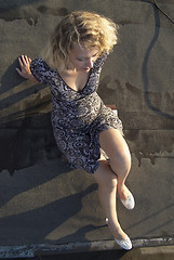 Image showing Girl on roof