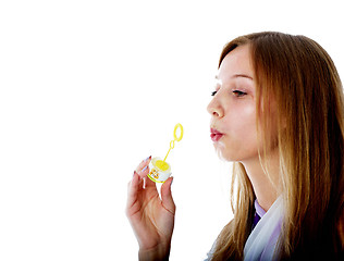 Image showing Attractive girl with soap bubbles