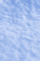 Image showing Detail of snow texture with shadows - background