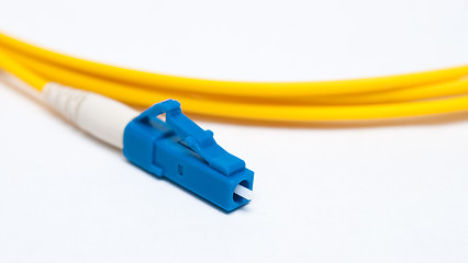 Image showing Optical single mode LC patch cord on white background. 