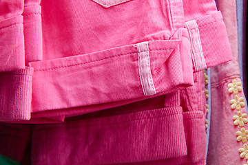 Image showing children's trousers on a hanger in the store