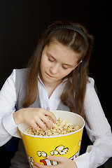 Image showing girl asleep in a movie theater