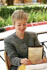 Image showing Businesswoman at lunch