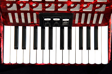 Image showing red accordion detail