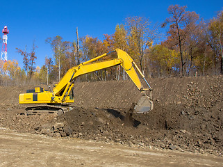 Image showing Yellow backhoe