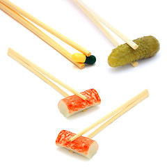 Image showing sushi cucumber and  tablet on chopstick