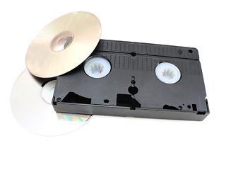 Image showing DVD disks and VHS video the cartridge