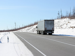 Image showing The truck on a winter road.