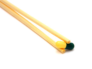 Image showing sushi tablet on chopstick