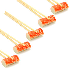 Image showing sushi on chopstick