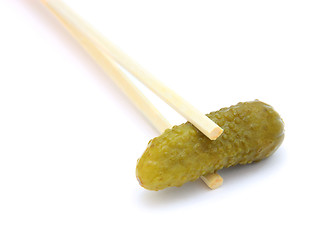 Image showing sushi cucumber gherkin on chopstick