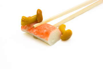 Image showing sushi on chopstick with mushrooms