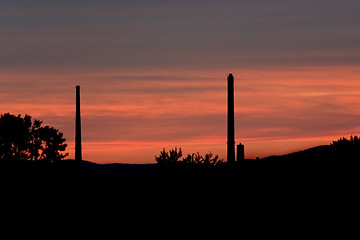 Image showing Mountains and the Silos as Sihoutte