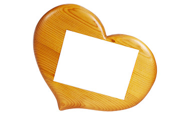 Image showing wooden frame in the form of hearts, isolated on white 