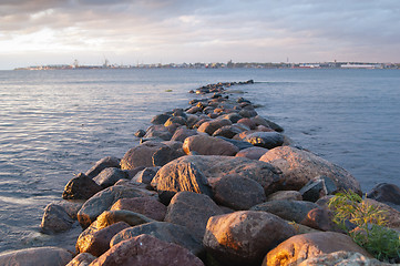 Image showing Pier from stones on a sunset