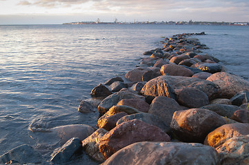 Image showing Pier from stones on a sunset