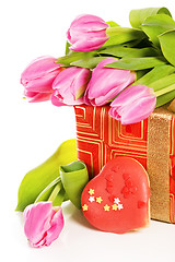 Image showing Pink tulips and gift box, it is isolated on white