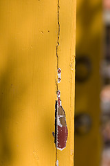 Image showing Background - Yellow Orange Door with Chipped Off Paint