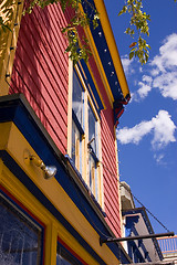 Image showing Close up on an Old Colorful Building with Cloudy Background