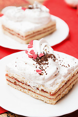 Image showing Puff cake with whipped cream, a close up