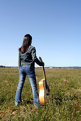 Image showing Woman guitar player